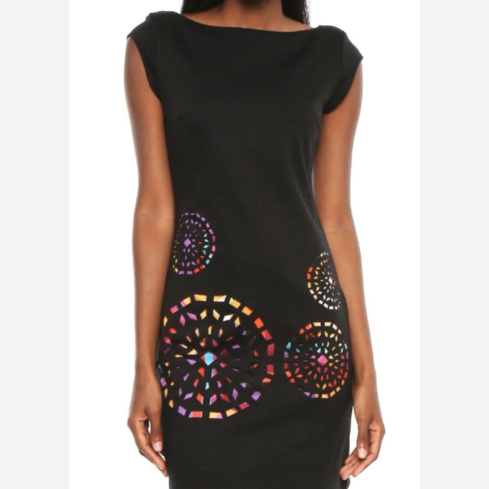 Super fun black Desigual dress with fun cut outs and low back.